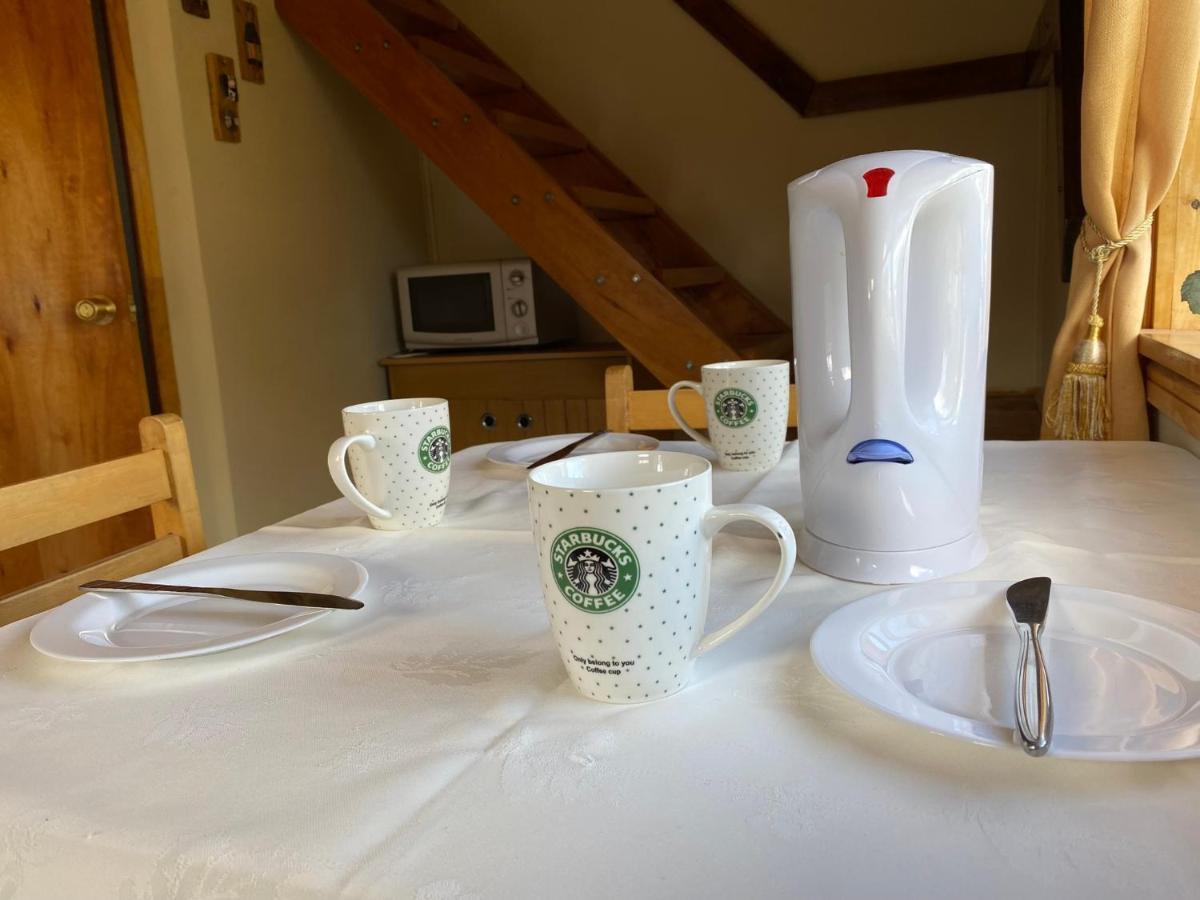 Hostal Los Pioneros ปวยร์โตนาตาเลส ภายนอก รูปภาพ
