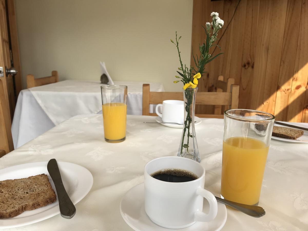 Hostal Los Pioneros ปวยร์โตนาตาเลส ภายนอก รูปภาพ